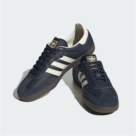 navy blue adidas sambas